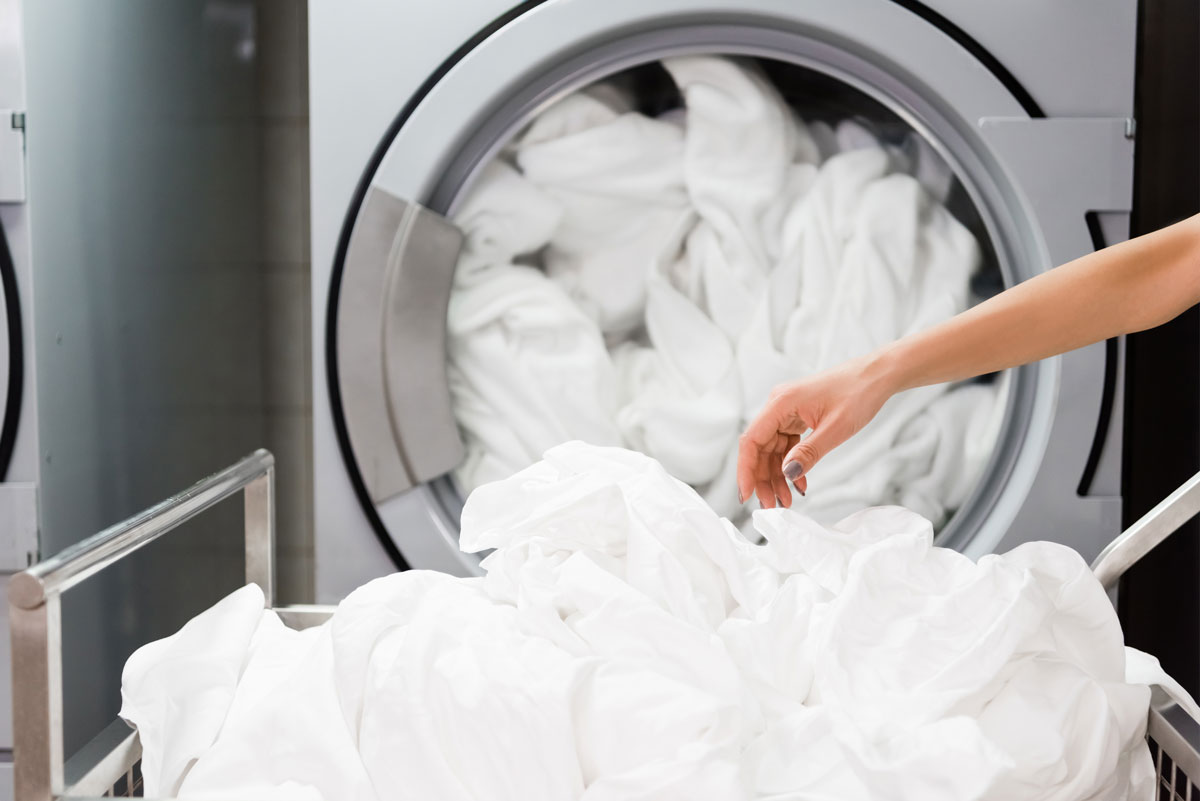 washing hotel towels